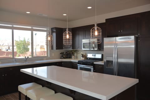 Delux kitchen with pebble ice maker, gas range & walkout outdoor dining area.