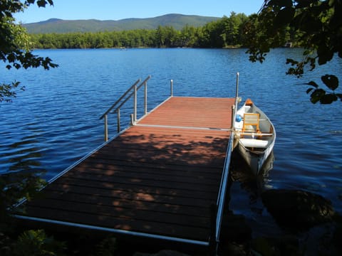 Enjoy coffee on the dock, a paddle in the canoe, a hike in the Mts., and a swim.