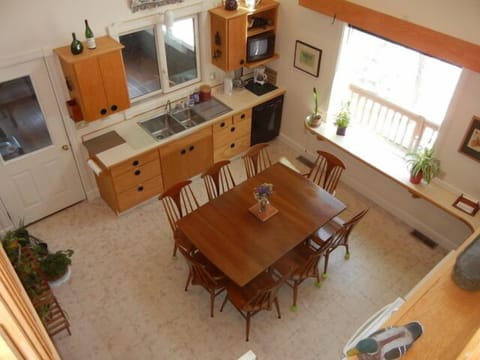 Loft view of kitchen with table leaves in
