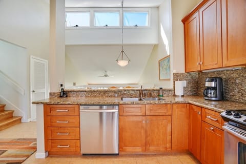 View to the Dining Room.  Windows open to cool the house with an ocean breeze.