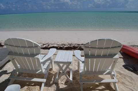 On the beach, sun loungers, beach towels