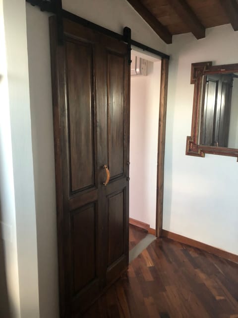 Barndoor entrance to master bedroom