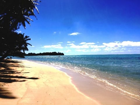 On the beach, sun loungers, beach towels