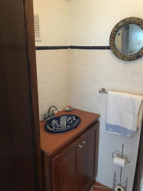 Combined shower/tub, hair dryer, towels, soap