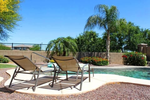 Paradise! Relax by your private pool backing onto a green space.