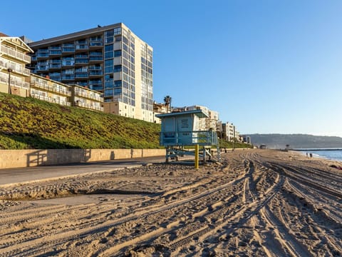 On the beach, sun loungers, beach towels