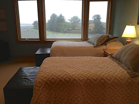 Bedroom 3 with TV where beds can be configured a couple of different ways.