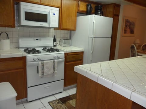 Gas stove with microwave