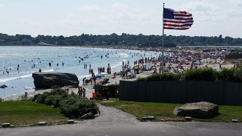 On the beach, sun loungers, beach umbrellas, beach towels