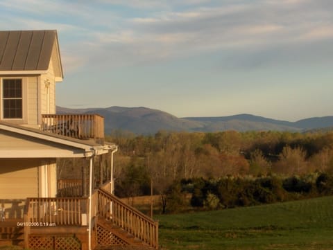 The Front Door of the Cottage with the Blue Ridge Mtns in the distance.