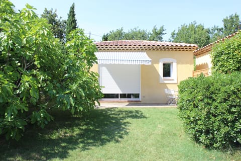 Sunny terras (south side) with garden and shade of fig tree