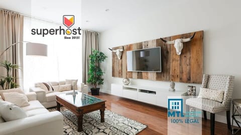 We are Superhost since 2015, with over a 1000 great reviews ! We have all the city permits and insurance required.                 *** 100% LEGAL ***This is the wide and bright living room with 55" Smart Roku HD TV with cable. Log in to your (Netflix, Disney +, Prime...) accounts. Contact us!