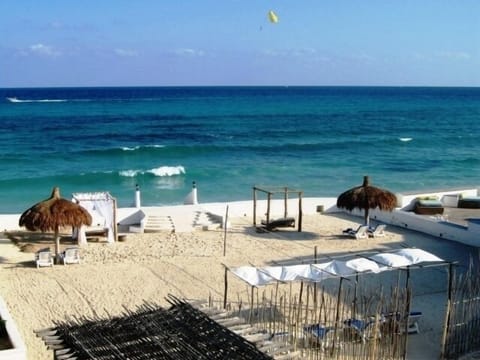 On the beach, sun loungers, beach towels