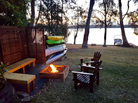 Relaxing Fire Pit along with Canoes and Kayaks for guest use. 