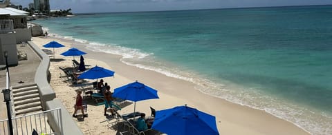 On the beach, sun loungers, beach towels