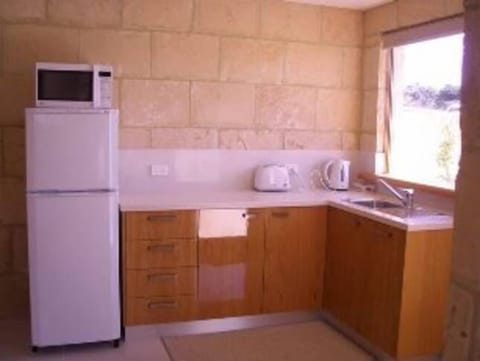 Fridge, microwave, toaster, cookware/dishes/utensils