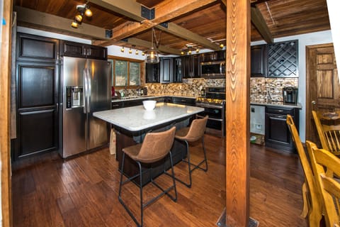 Newly renovated kitchen with tons of room for gathering and cooking.