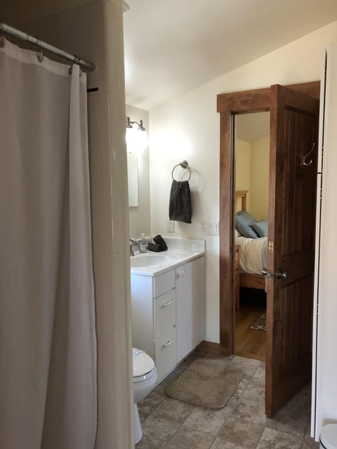 Combined shower/tub, hair dryer, towels, soap