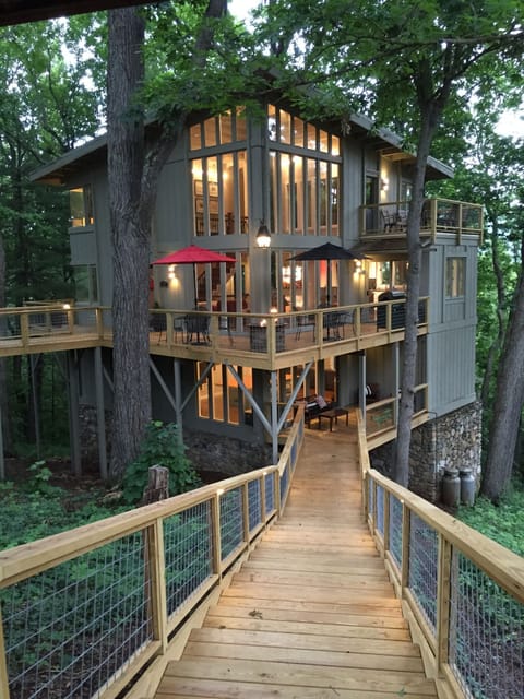 Lower level deck with stairs to carport