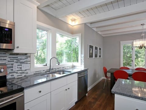 Updated kitchen with stainless appliances. Utility room with washer and dryer.