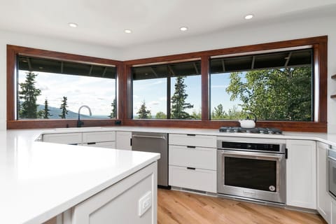 Kitchen overlooking the  Eagle River  and Anchorage