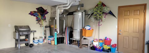 Garage with bbq grill, beach toys 