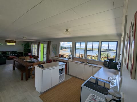 House layout. Kitchen, Dining & Living.
Dining table sits up to 8 comfortably.