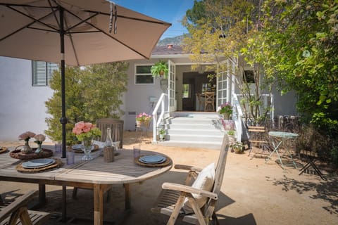 Relaxing dining area in the private back yard - looking toward the mountains
