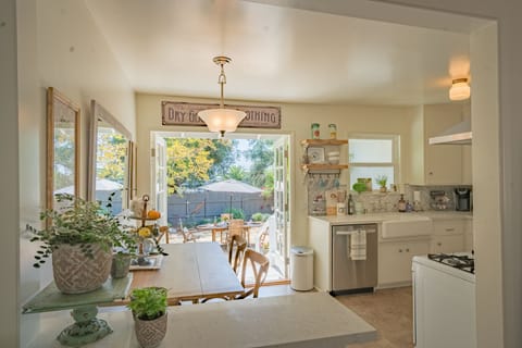 Bright clean and updated kitchen leading to the private yard