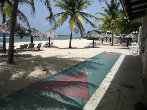 On the beach, sun loungers, beach towels