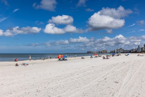 On the beach, sun loungers, beach towels