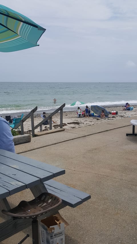 On the beach, sun loungers