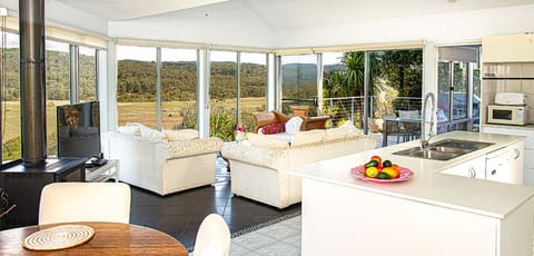 From dining area across living to view and deck.