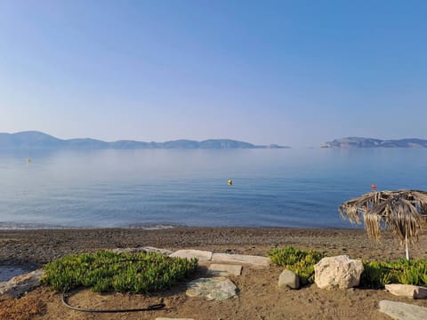 On the beach, sun loungers, beach towels