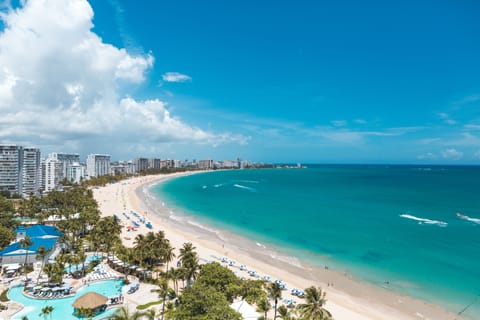 On the beach, sun loungers, beach towels