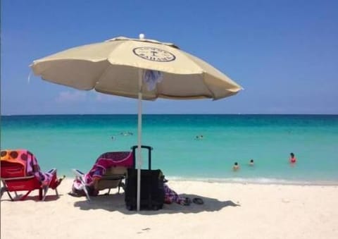 Beach nearby, sun loungers