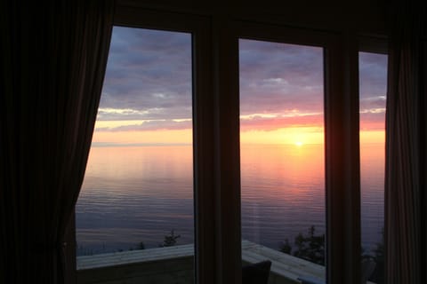 view of ocean out front windows, with awesome sunsets, whales, eagles