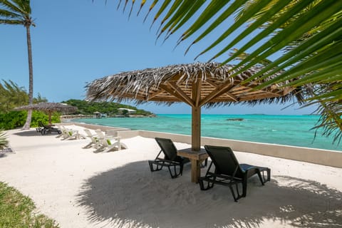 On the beach, sun loungers, beach towels