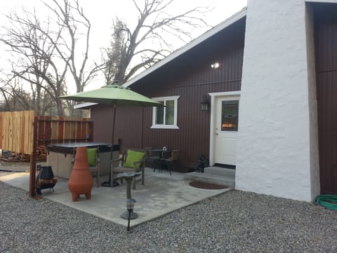 Riverside's private patio, hot tub and chimnea.