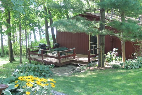 View of deck and entrance to cabin.