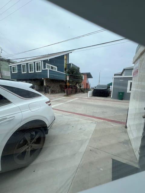 Outside parking spot
Large vehicle 
View and steps to ocean