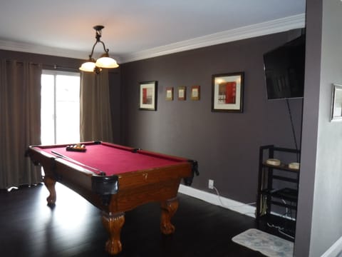 Pool Hall has Smart TV and TWCable.,k with slider to side yard for gathering.