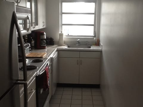 Kitchen - renovated with new lighting, fridge, and dish washer.