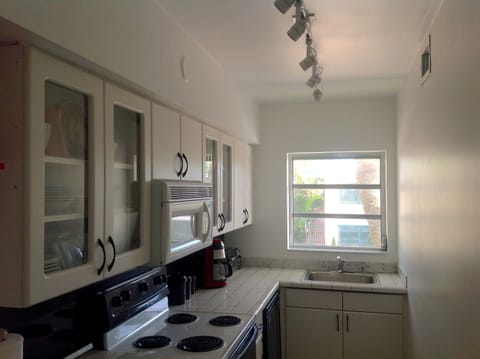 kitchen - new lighting, refrigerator and dishwasher.