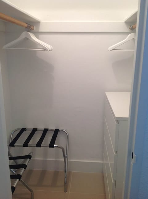 Walking closet with two baggage stands