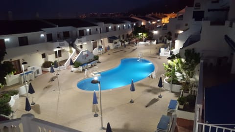 Outdoor pool, a heated pool, sun loungers