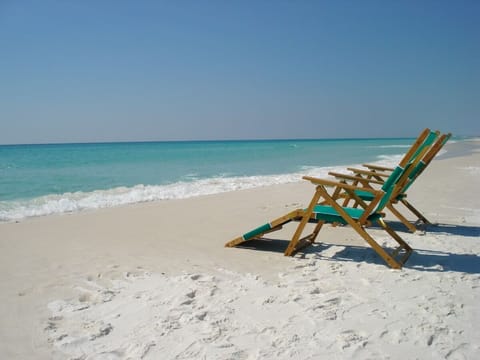 On the beach, sun loungers