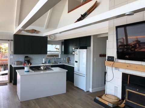 All new appliances. Cooktop has a downdraft vent.