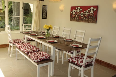 Dining table sits 10 with a breakfast bar for 4