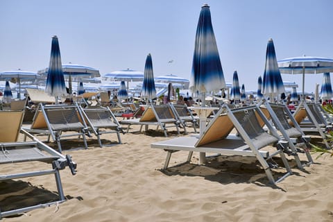 Beach nearby, sun loungers